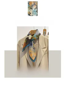 French style floral cotton linen square scarf draped over a light beige blazer