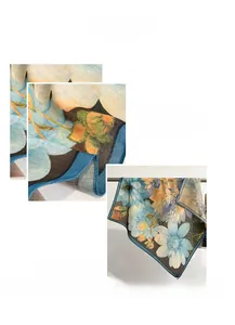 Close-up of machine-stitched edges and floral print detail on high-quality silk scarf