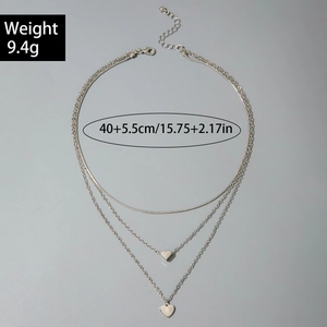 Detail of silver heart pendant layered necklace with dimensions 40+5.5cm and 9.4g weight