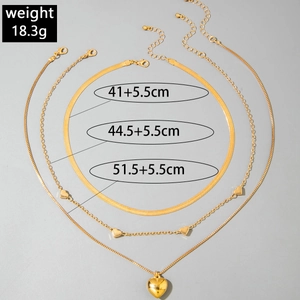 Detailed view of layered gold heart necklaces with precise length and weight measurements