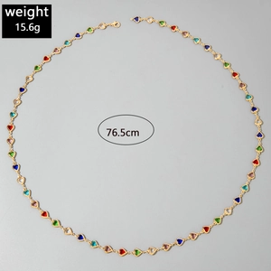 Detail view of 76.5cm gold layered necklace with colorful heart-shaped crystal stones