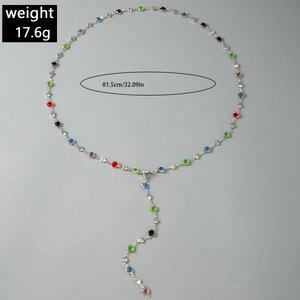 Detail showing colorful crystals on silver Y-shaped long necklace with dimensions and weight