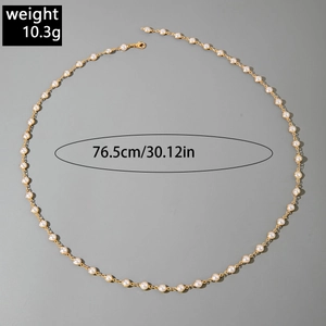 Detailed view of layered gold chain necklace with pearls showing 76.5cm length and 10.3g weight