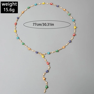 Detail of colorful enamel heart necklace with dimensions 77cm length and 15.6g weight