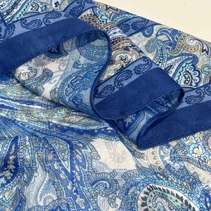 Blue paisley patterned scarf made of soft linen-touch fabric in a stylish square design