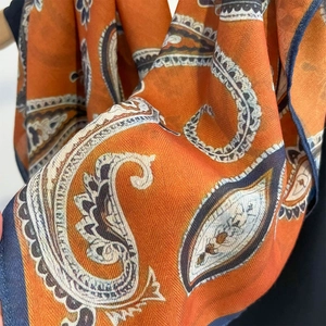 Classic orange paisley cotton linen bandana with navy blue trim for spring and summer