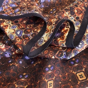 68cm square silk scarf with abstract geometric patterns and exquisite rolled edges