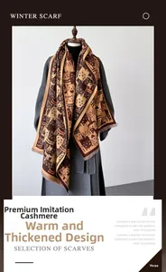 Détail d'une écharpe douce en imitation cachemire avec motif chat marron et franges