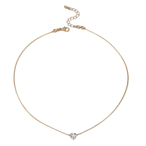 Elegant gold heart pendant necklace with clear faceted gemstone on a delicate chain