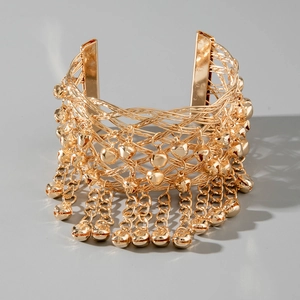 Bracciale etnico intrecciato oro con campanellini in metallo e dettagli a frangia