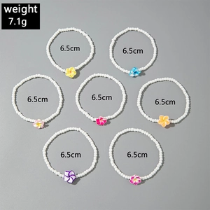 Detail of 7 bohemian colorful resin flower beaded anklets with 6.5cm diameter for women