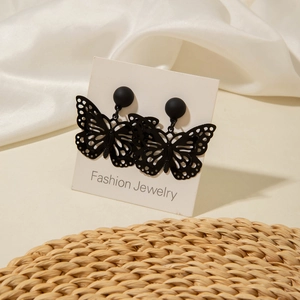 3D hollow butterfly stud earrings in matte black finish for a gothic minimalist style