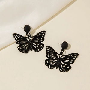 Dark butterfly stud earrings featuring a hollow black matte wing design for women