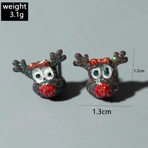 Glittery resin reindeer stud earrings showing 3.1g weight and 1.3cm x 1.2cm dimensions