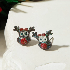 Close-up of reindeer stud earrings made of dark glitter resin with a festive red nose