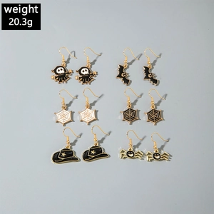 Detailed set of six pairs of Halloween earrings including skull, bat, and spider motifs