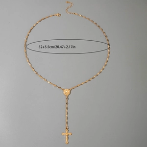 Detailed view of golden rosary style necklace with cross pendant and 52cm chain length