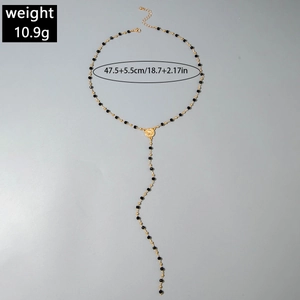 Y-shaped gold beaded necklace detail with 10.9g weight and 47.5cm plus 5.5cm chain length