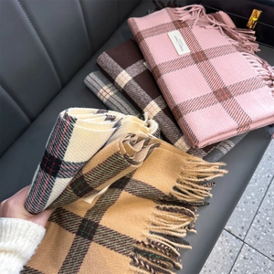 Classic checkered cashmere-feel scarf with fringe, shown in pink, brown, grey, and camel colors