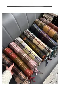 Selection of vintage plaid scarves in various colors with soft fringe details