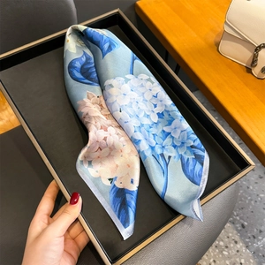 Blue mulberry silk square scarf with purple hydrangea floral print and hand-rolled edges