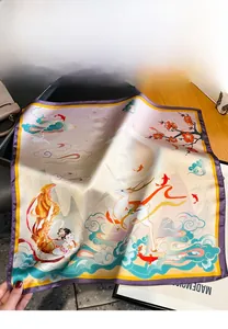 Close-up of Dunhuang style silk scarf featuring traditional Nine-colored Deer and floral patterns