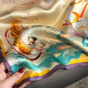 Silk square scarf with Dunhuang mural patterns of flying Apsaras and deer on dark leather