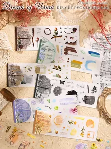Dettaglio di adesivi vintage in PVC con fiori e farfalle per scrapbooking e arte