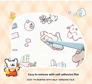 Close-up of cute cartoon bear stickers with pre-cut edges for easy removal with tweezers