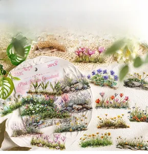 Macro detail of PET watercolor floral stickers featuring dandelions and daisies on a lace cloth