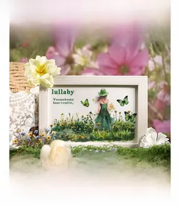 Detail of floral PET stickers showing a girl and butterflies on a white picture frame