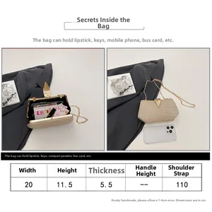 Detailed size chart showing 20cm width and internal capacity of gold leaf clutch bag