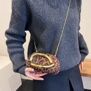 Fashionable leopard print crossbody bag with gold U-handle and detachable chain strap