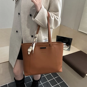 Brown leather tote bag with silk scarf handle and large capacity for women commuting