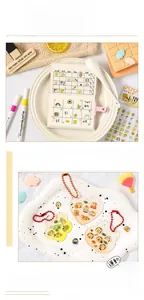 Close-up of cute cartoon PET stickers and acrylic charms in a creative stationery set