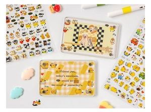 Close-up of cute cartoon animal stickers and acrylic magnetic frames for journaling