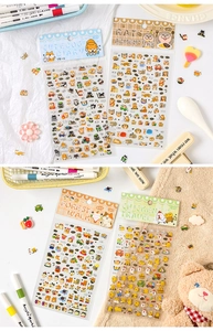 Close-up of cute cartoon PET stickers with animal themes for scrapbooking and DIY decor