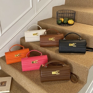 Woven small square tote bags in six colors with gold metal buckles and top handles