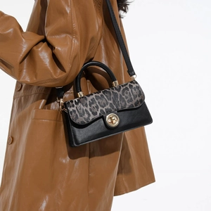 Retro leopard print crossbody bag with gold twist lock and black leather accents for women