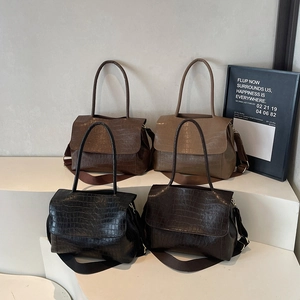 Large croc-embossed tote bags in four retro colors with adjustable wide shoulder straps