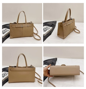 Détail du sac cabas kaki montrant la texture tissée, les sangles et les angles variés