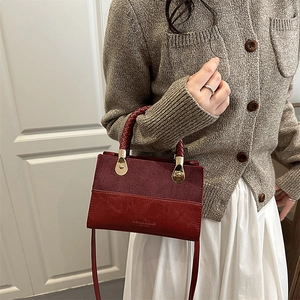 Retro burgundy patchwork crossbody bag with matte finish and elegant top handle for women