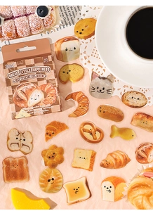 Close-up of cute hand-drawn bread stickers with croissant and toast designs for journaling