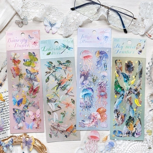 Artistieke PET stickers set met vlinder, libel, kwal en veer motieven voor scrapbooking