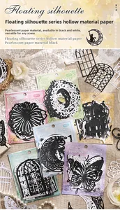 Dettaglio macro di silhouette vintage in carta perlata traforata con motivi di farfalle e fiori