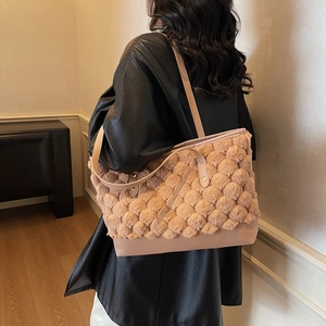 Minimalist large capacity fluffy tote bag in apricot with plush circular pattern and leather strap