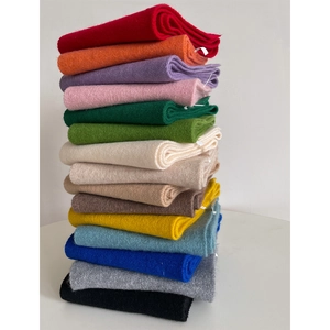 Close-up showing the thick knitted texture and variety of 15 colors for the winter scarf