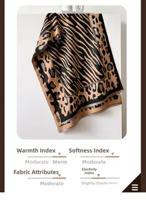 Detailed view of leopard and zebra print thick winter scarf with soft fringed edges