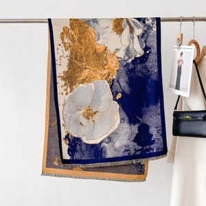 Elegant jacquard floral shawl with navy blue and gold accents for autumn winter style