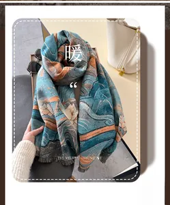 Detail of vintage lotus pattern jacquard scarf with thick tassel edges and soft texture